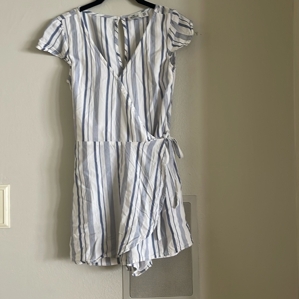This is a super cute blue and white romper from Hollister size extra small!